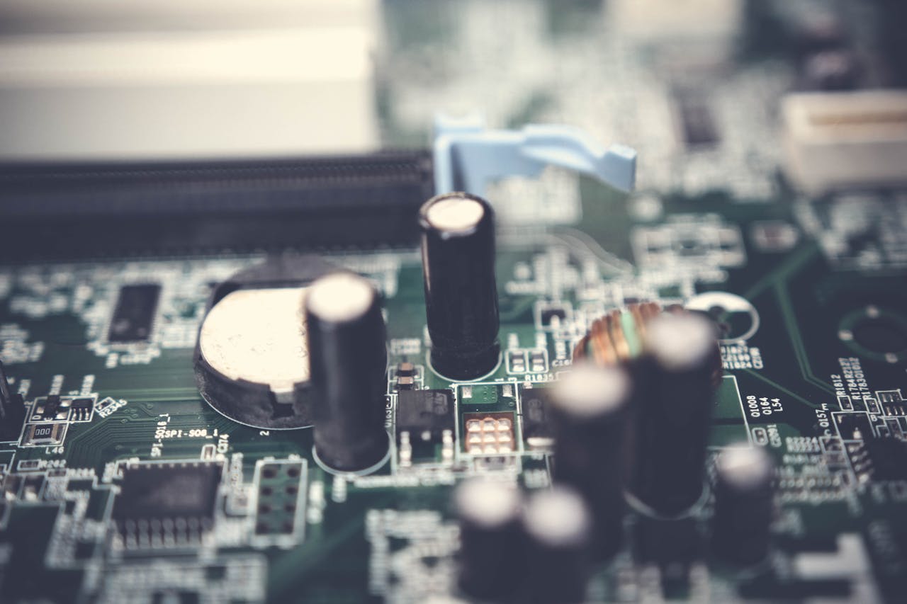 Detailed view of electronic components on a circuit board showcasing various parts.